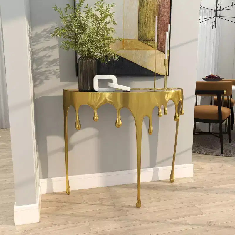 Consola de Aluminio con Patas Diseñadas de Efecto Derretido y Tapa de Cristal Ahumado