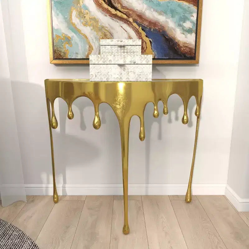Consola de Aluminio con Patas Diseñadas de Efecto Derretido y Tapa de Cristal Ahumado