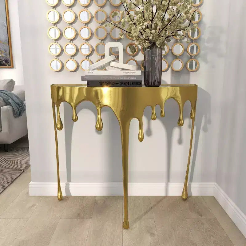 Consola de Aluminio con Patas Diseñadas de Efecto Derretido y Tapa de Cristal Ahumado