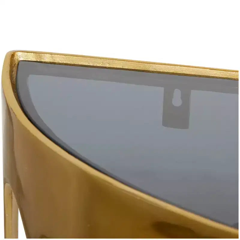 Consola de Aluminio con Patas Diseñadas de Efecto Derretido y Tapa de Cristal Ahumado