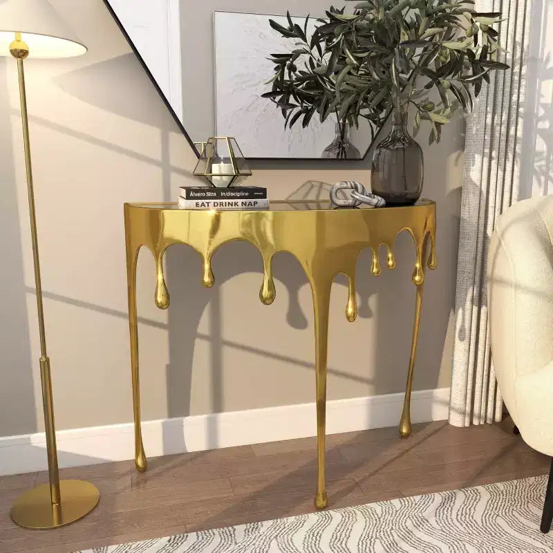 Consola de Aluminio con Patas Diseñadas de Efecto Derretido y Tapa de Cristal Ahumado