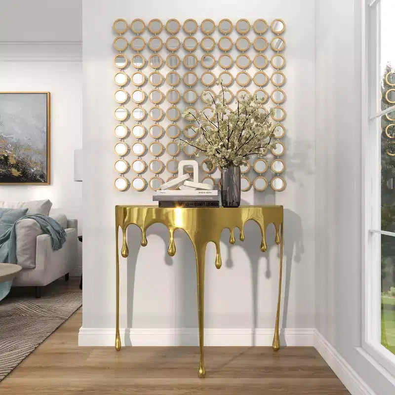 Consola de Aluminio con Patas Diseñadas de Efecto Derretido y Tapa de Cristal Ahumado