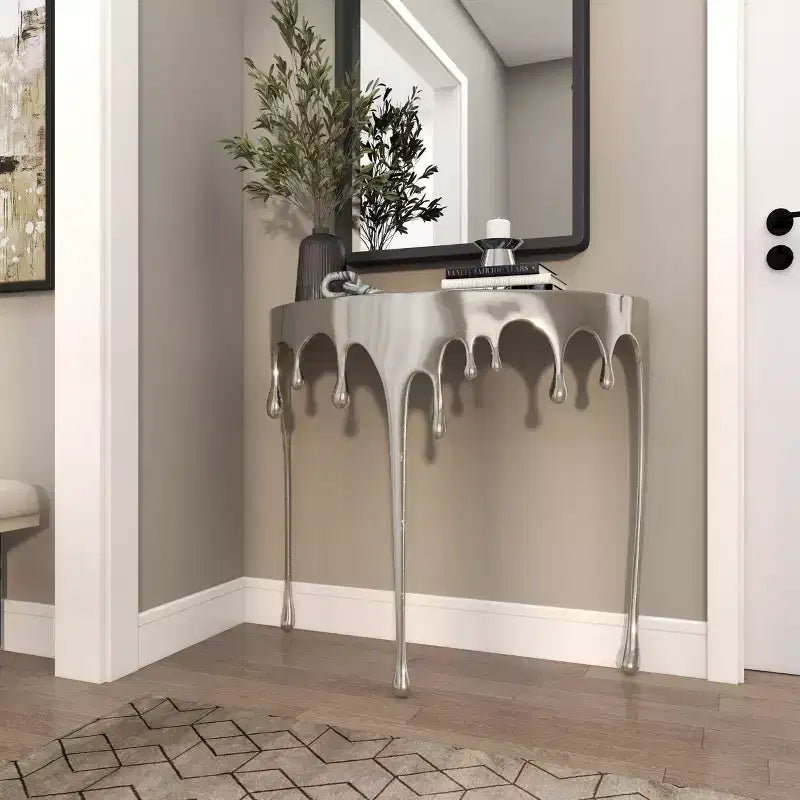 Consola de Aluminio con Patas Diseñadas de Efecto Derretido y Tapa de Cristal Ahumado