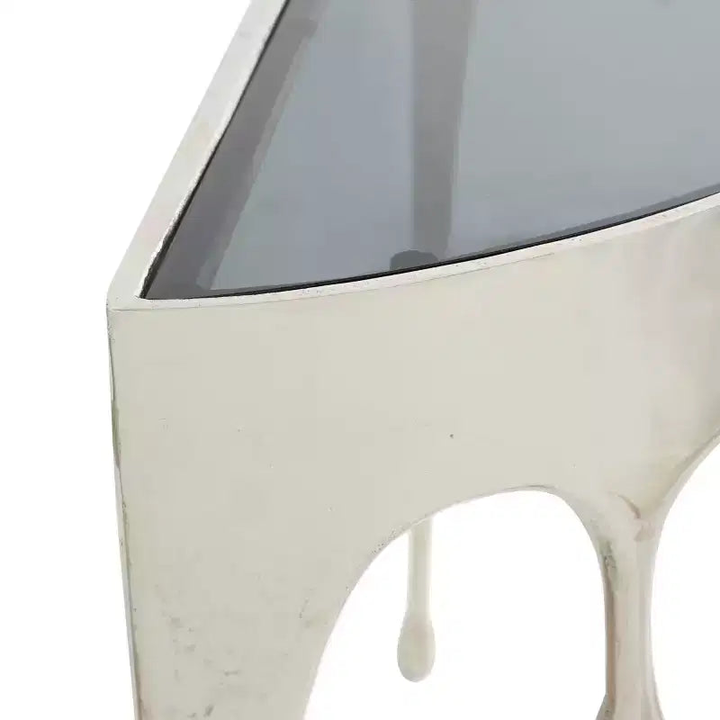 Consola de Aluminio con Patas Diseñadas de Efecto Derretido y Tapa de Cristal Ahumado