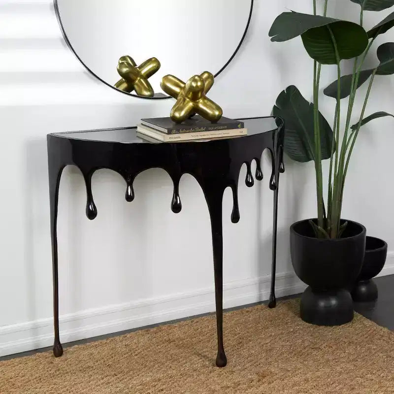 Consola de Aluminio con Patas Diseñadas de Efecto Derretido y Tapa de Cristal Ahumado